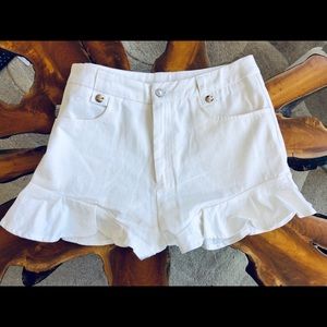 High waisted white ruffle hem shorts